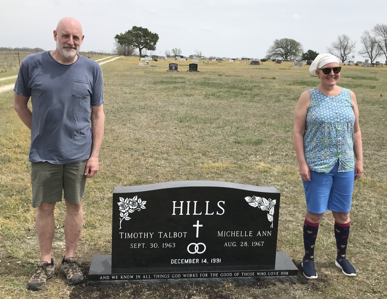 michelle and tim at cemetary with headstone